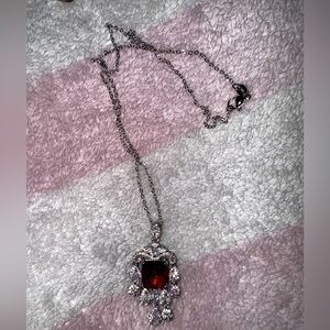Silver necklace with charm rhinestones big red stone